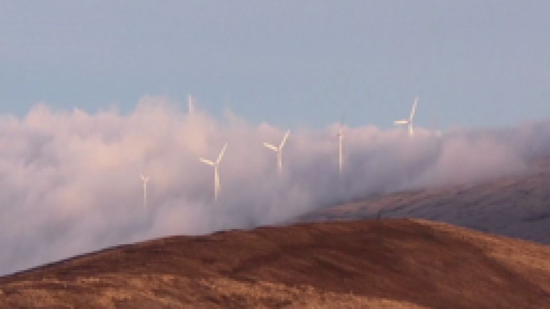 ⁣Windmills Spinning in the Clouds